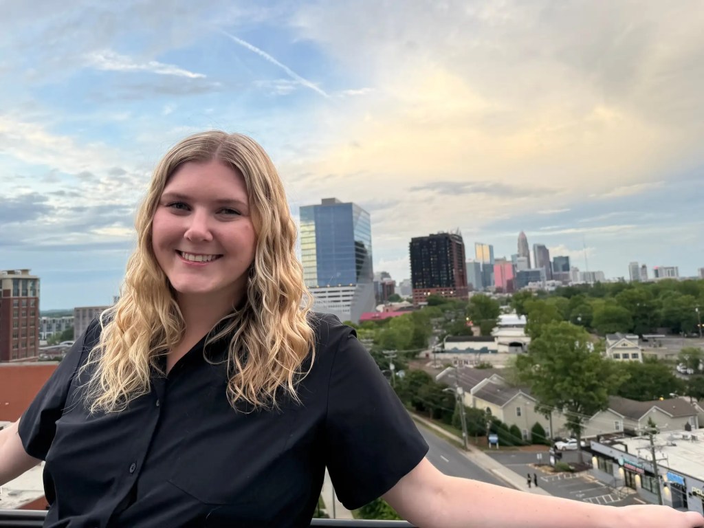 Elizabeth with the Charlotte skyline in the background